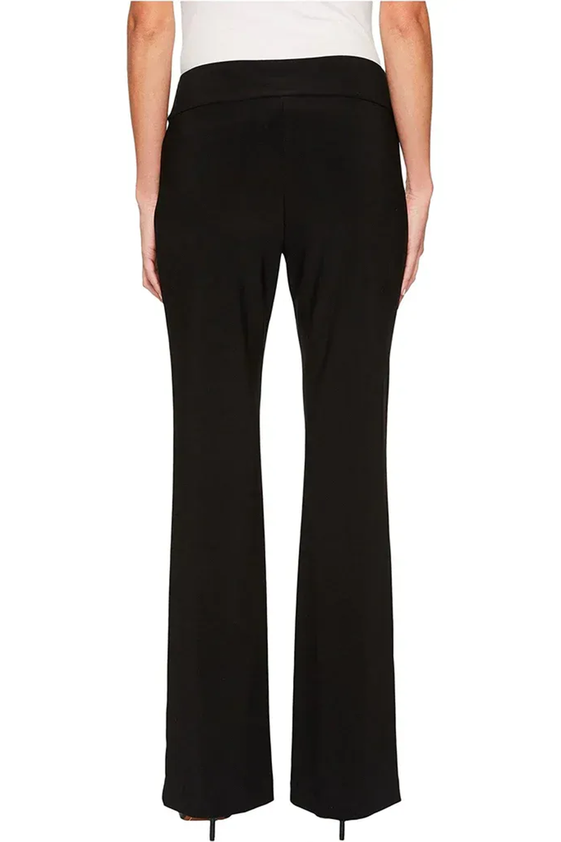 Black pants worn by a person on a white background