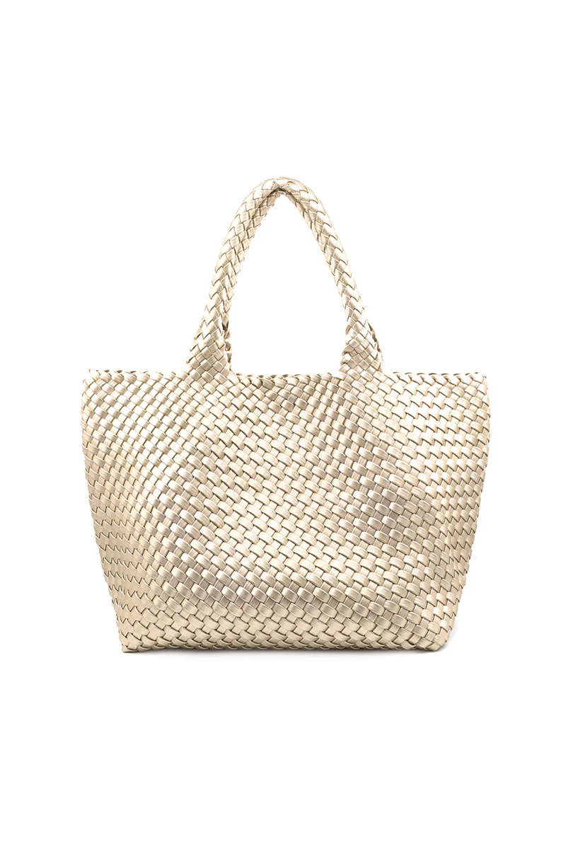 Woven metallic champagne colored handbag on a white background