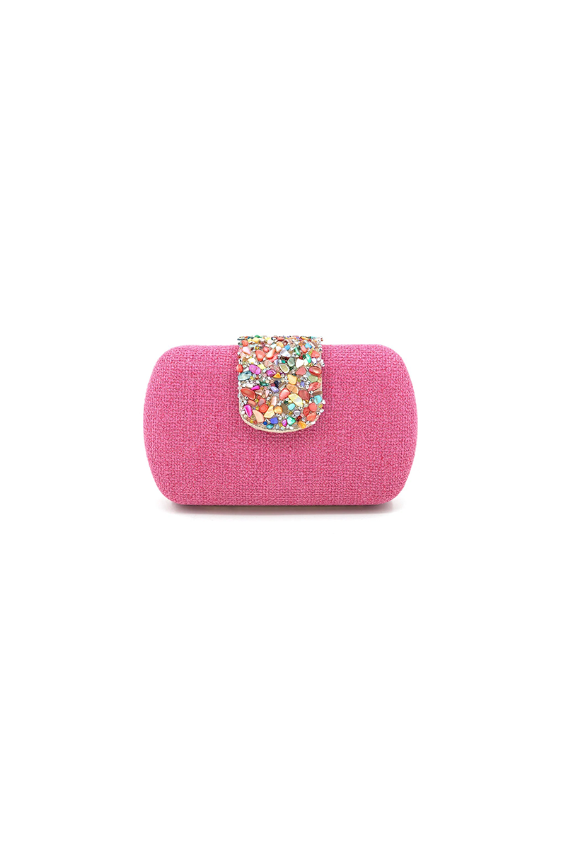 Pink clutch with a colorful gemstone clasp on a white background