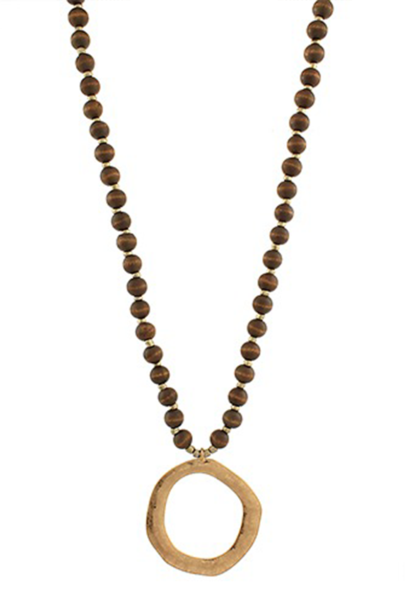 Wooden brown beaded necklace with a gold pendant on a white background