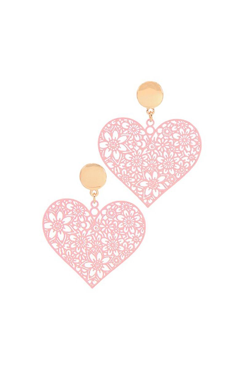 Heart-shaped earrings with floral cut-out design on a white background