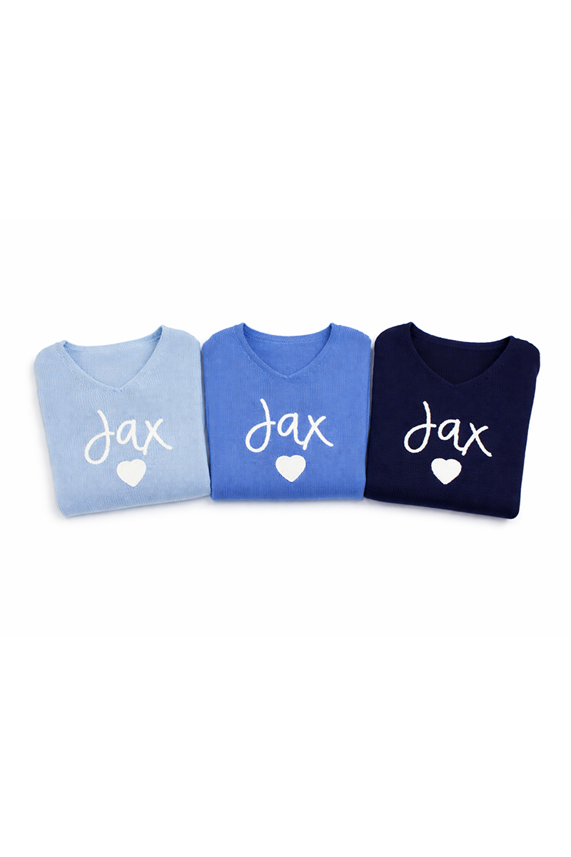 Three sweatshirts in blue, light blue, and navy with 'Jax' and heart designs on a white background.