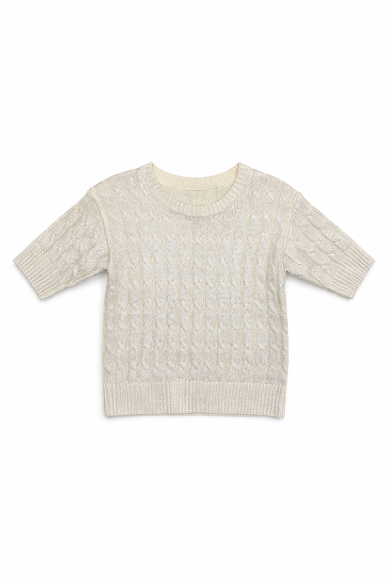 Metallic grey/silver cable knit sweater on a white background
