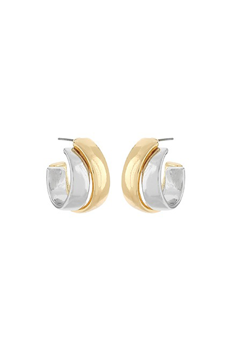 Pair of gold and silver hoop earrings on a white background