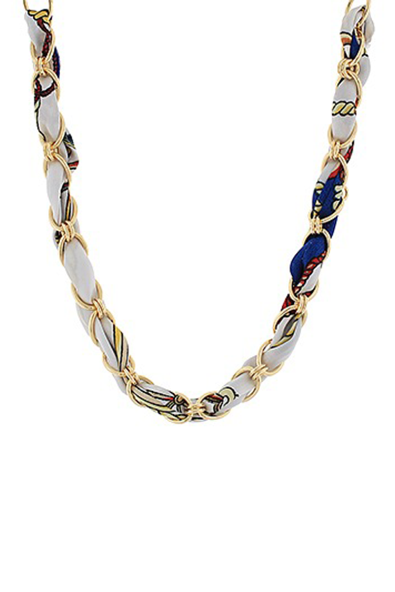 Necklace with blue and white satin scarf intertwined with a gold chain on a white background