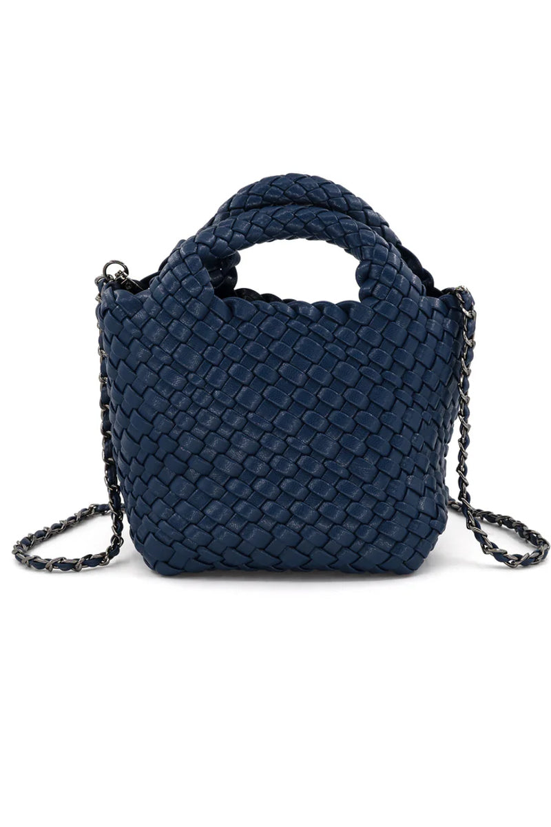 Navy woven handbag with a chain strap on a white background