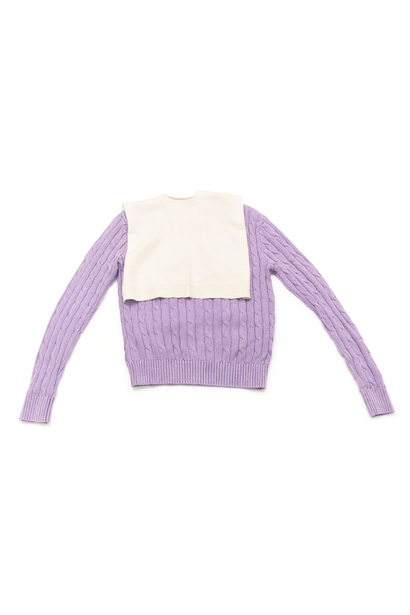Back of purple sweater with a white faux sweater wrap on a white background