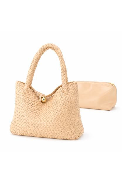 Beige woven handbag on a white background