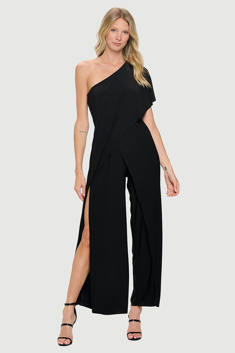 Woman wearing a black one-shoulder jumpsuit with a slit on a white background