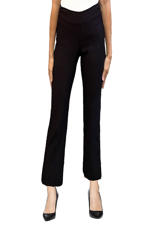 Woman wearing black pants and heels on a white background