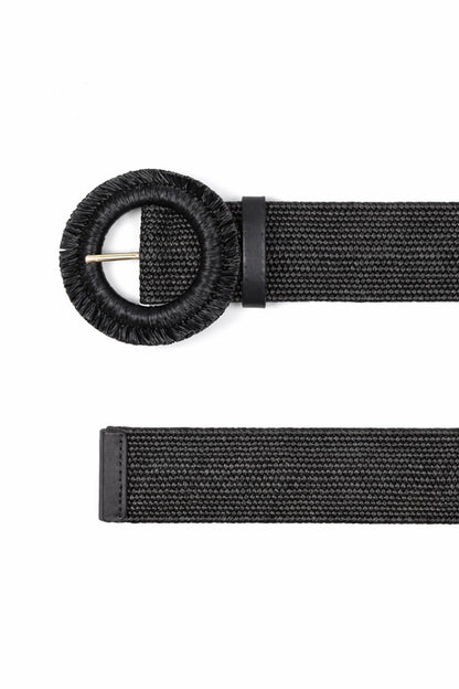 Black belt with a round buckle on a white background