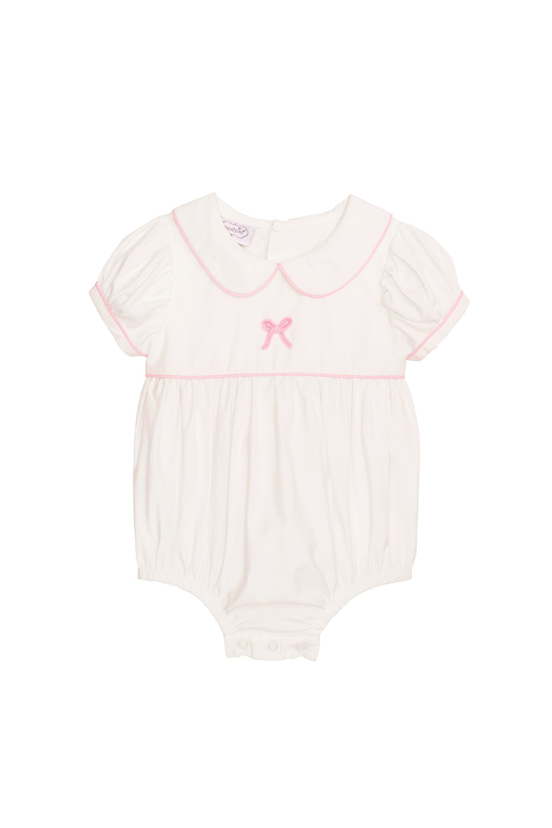 Baby romper with pink collar and bow on a white background