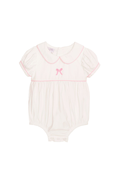 Baby romper with pink collar and bow on a white background