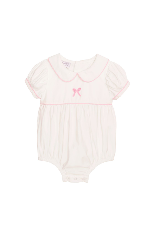 Baby romper with pink collar and bow on a white background
