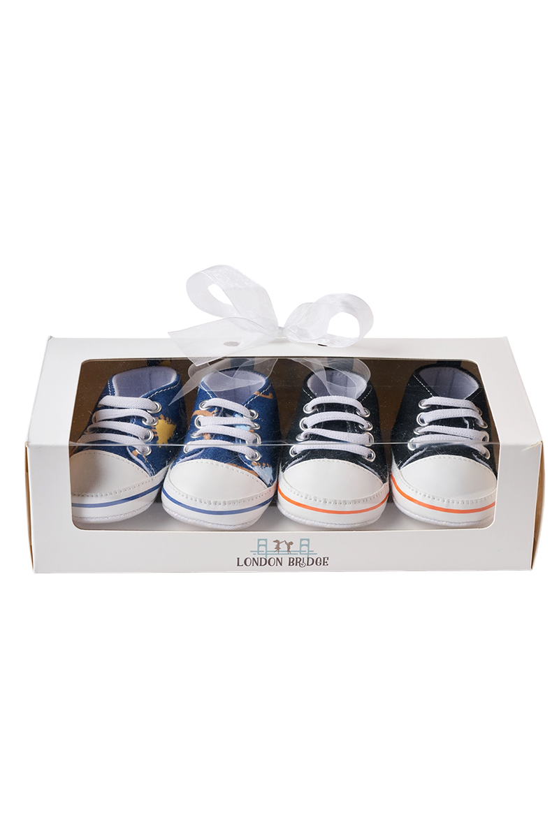 Set of baby boy sneakers in a box on a white background