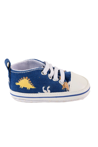Blue baby shoe with white laces and dinosaur design on a white background