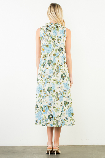 Woman wearing a floral dress with a white background