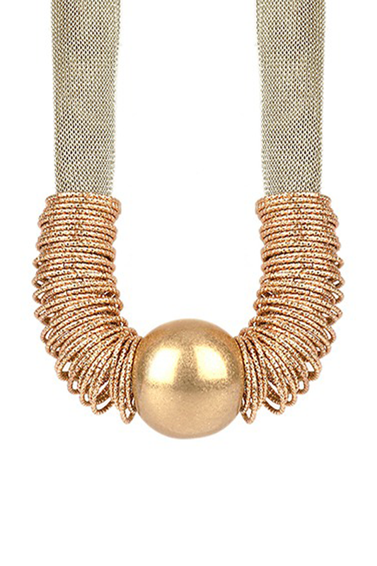 Necklace with gold spherical pendant and textured beige band on a white background