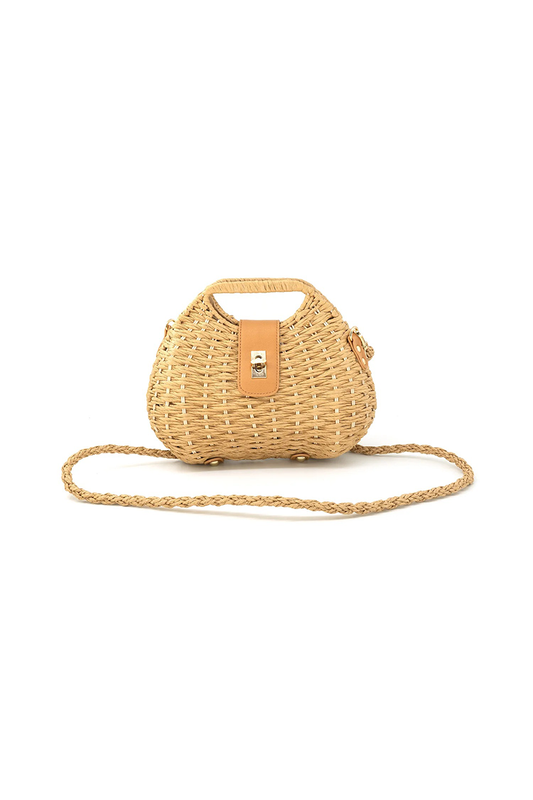 Woven handbag with a strap on a white background