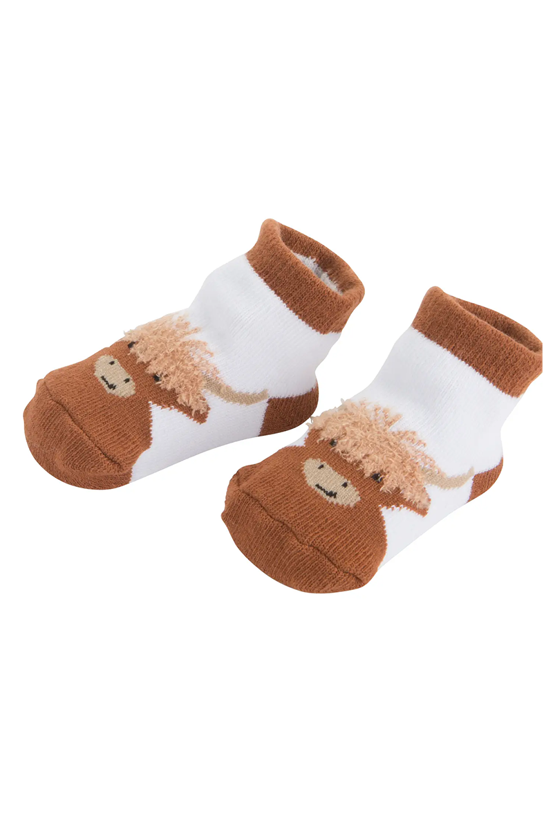 Pair of socks with highland cow illustration on a white background