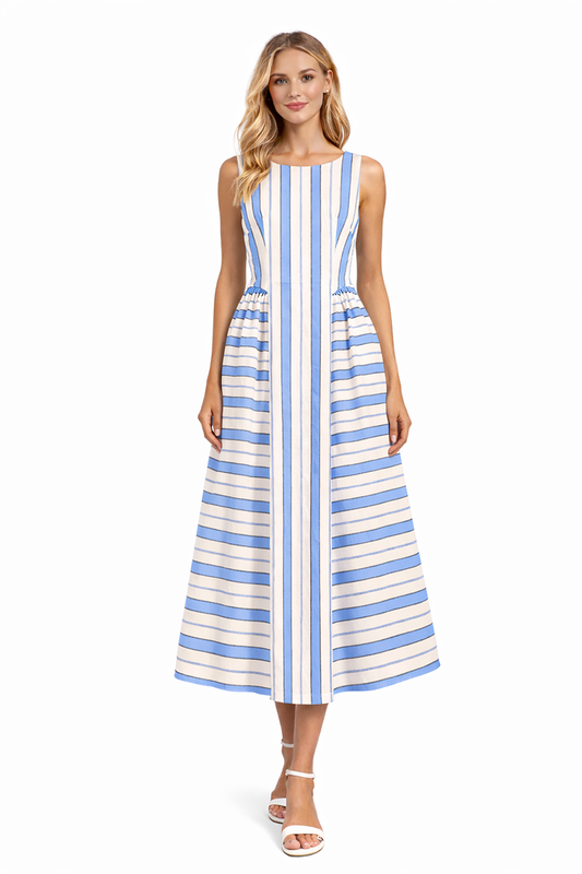 Woman wearing a blue and white striped dress on a white background