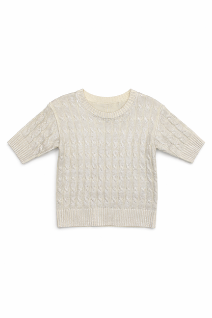 Metallic grey/silver cable knit sweater on a white background