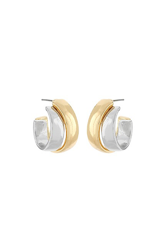 Pair of gold and silver hoop earrings on a white background