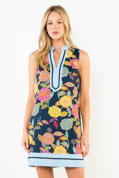 Blonde woman wearing Navy Floral Sleeveless Dress