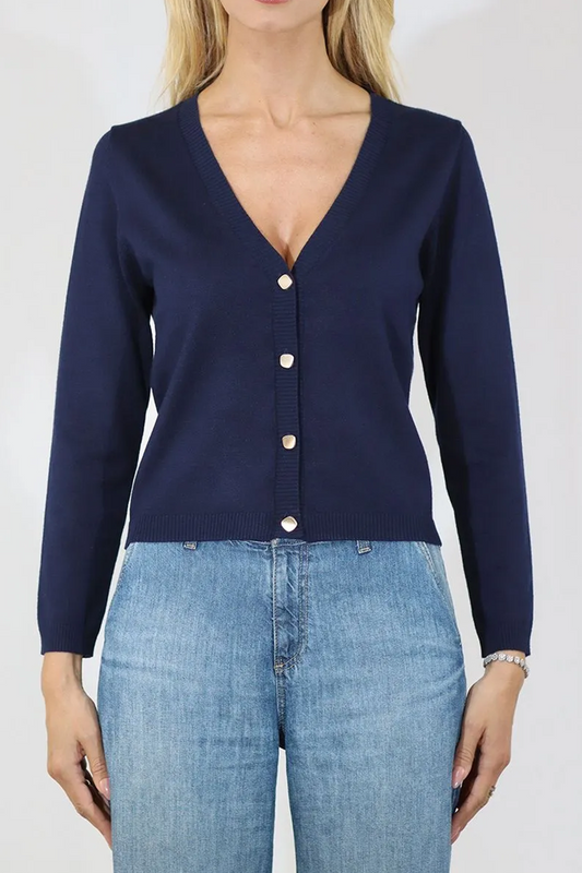 Navy cardigan worn by a person on a white background