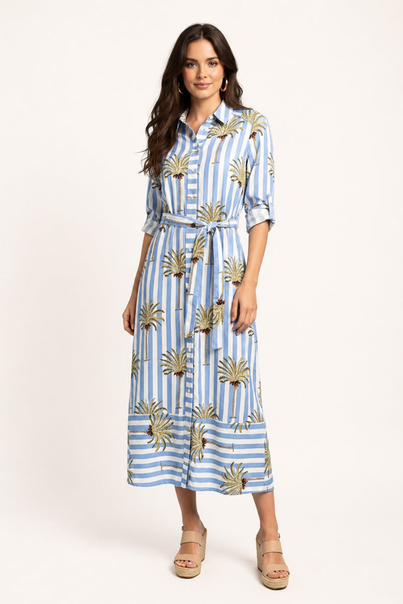 Woman wearing Palm Beach Striped Midi Dress with wedges on a white background