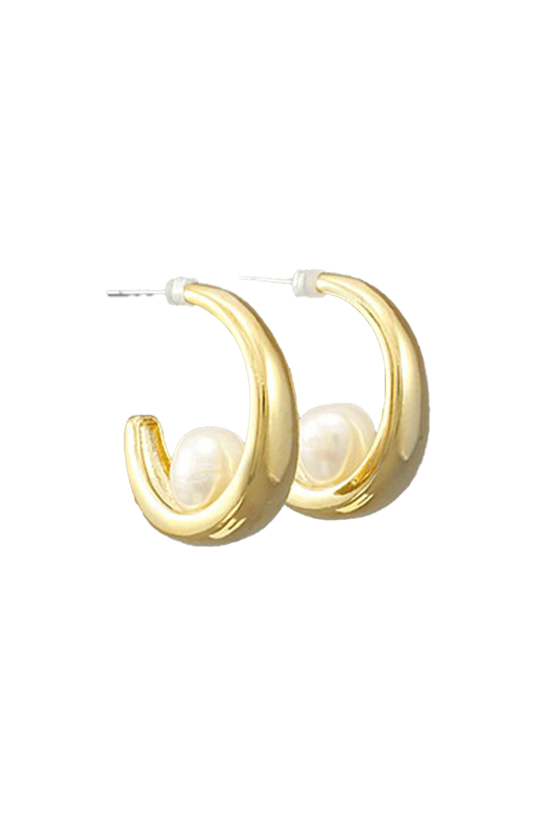 Gold hoop earrings with pearl-like centers on a white background