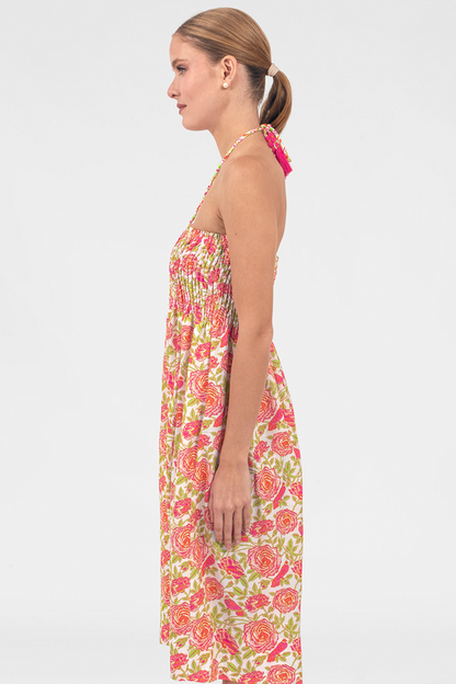Woman wearing a floral dress on a white background