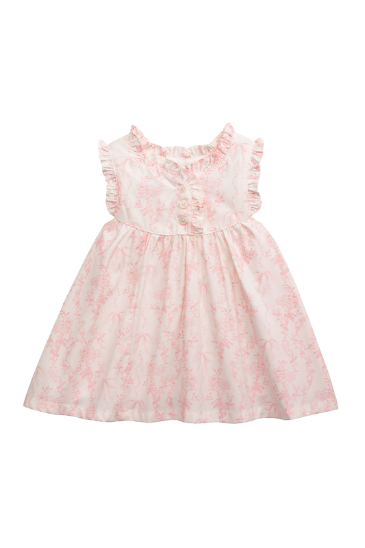 Pink floral girls dress on a white background