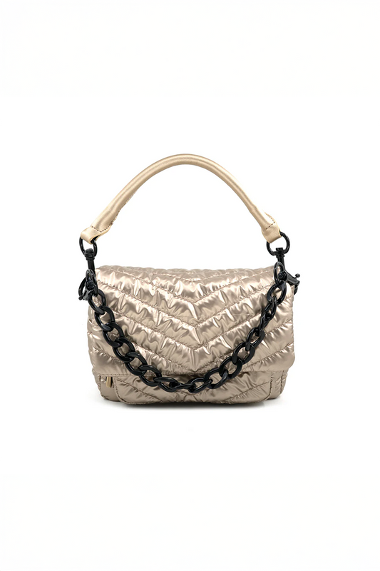 Gold quilted handbag with black chain detail on a white background