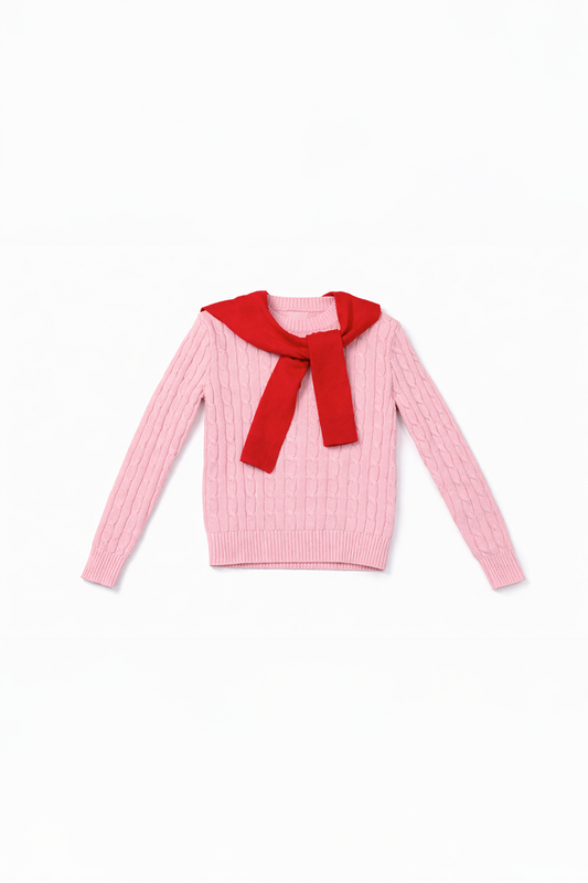 Pink sweater with a red shawl wrap on a white background