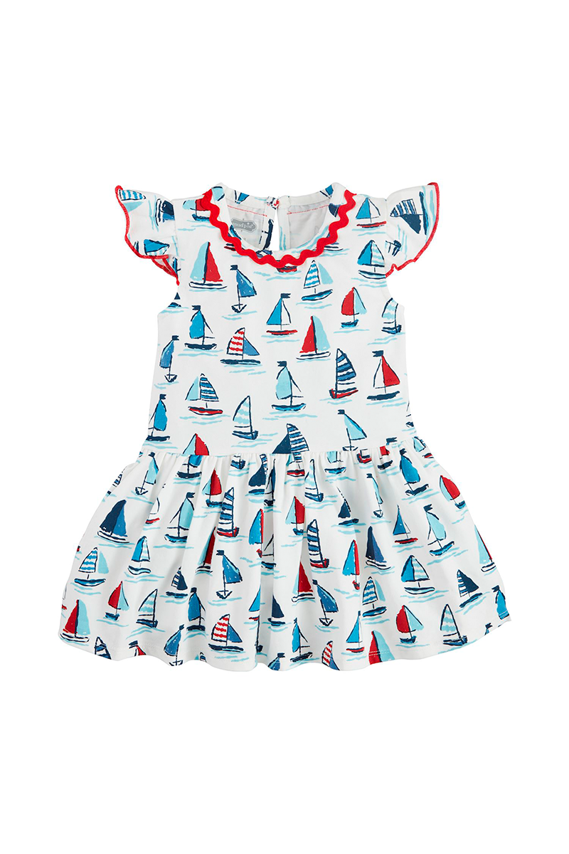 Children's dress with sailboat pattern on a white background