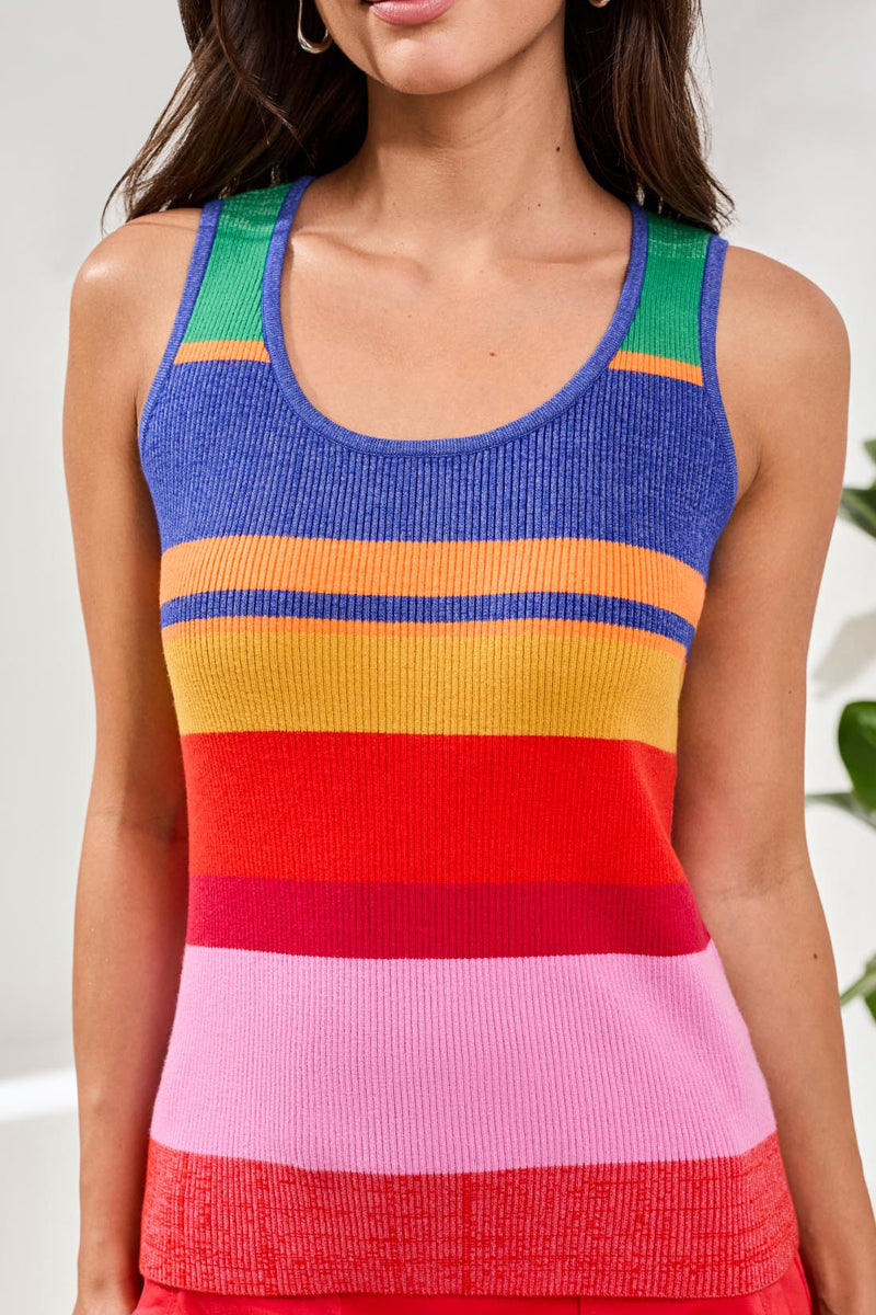 Colorful striped tank top worn by a person against a neutral background