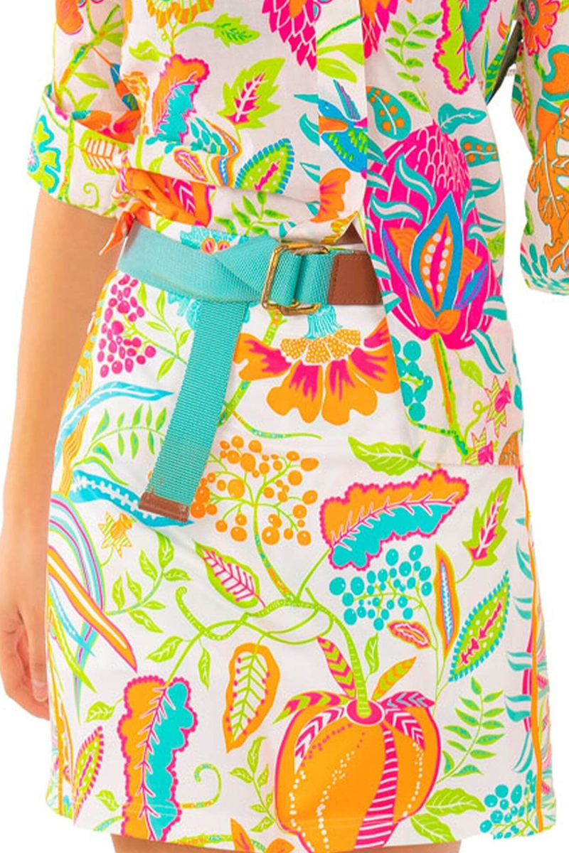 Colorful floral dress with a turquoise belt on a white background