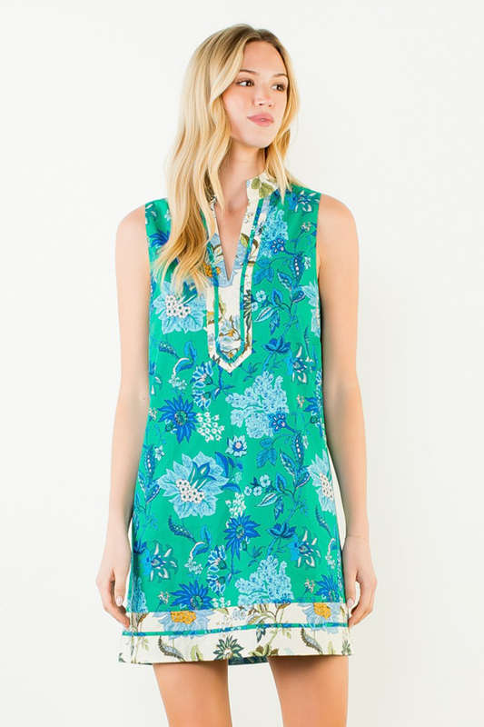 Woman wearing a floral dress on a white background