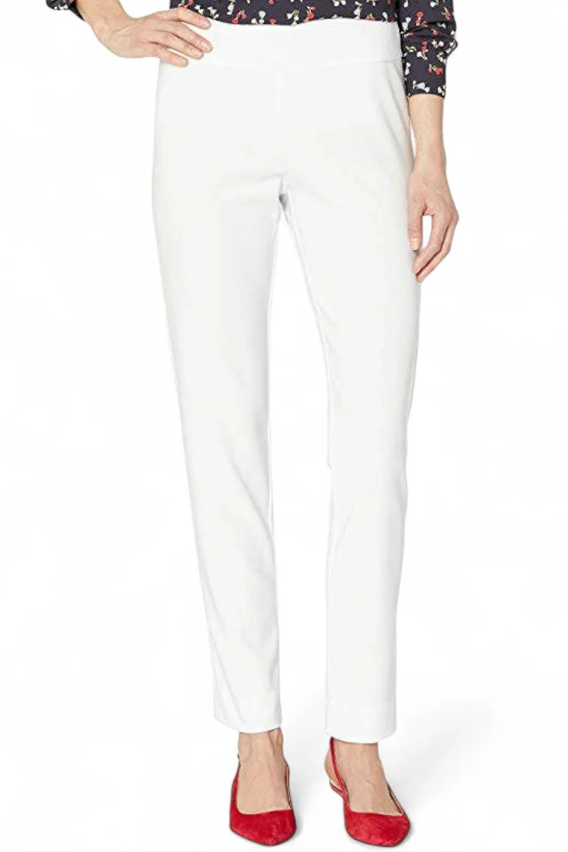 White pants worn by a person on a white background